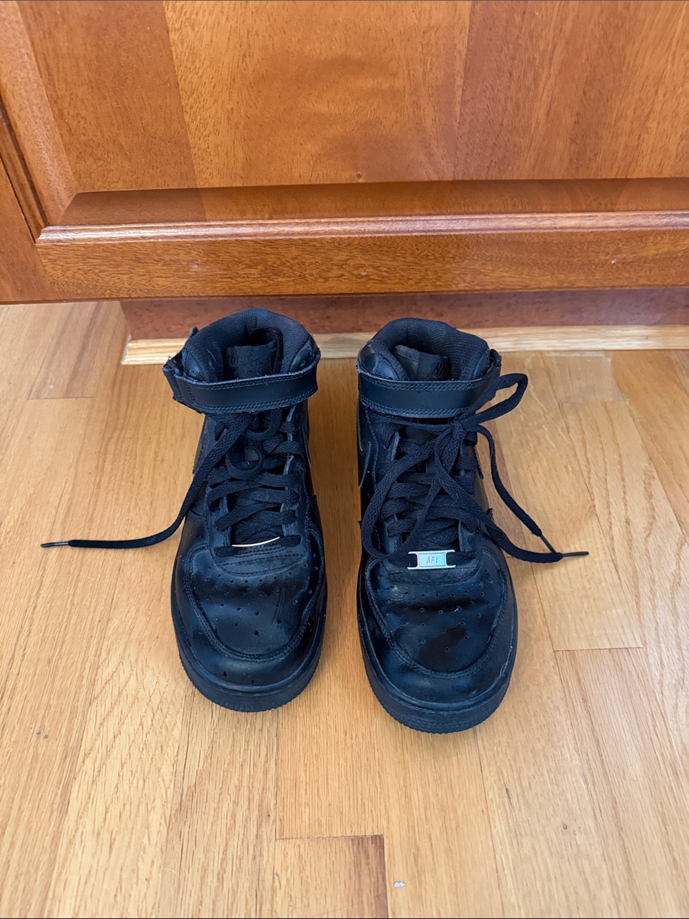 Nike Women’s Air Force Ones Black High-Top Sneakers